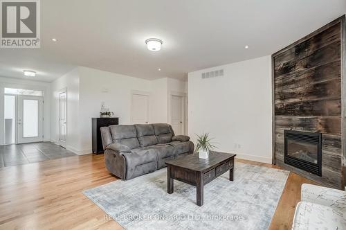 6237 Perth Street, Ottawa, ON - Indoor Photo Showing Living Room With Fireplace