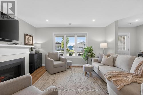 187 Lake Breeze Drive, Ashfield-Colborne-Wawanosh (Colborne), ON - Indoor Photo Showing Living Room With Fireplace