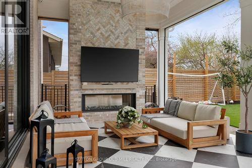 18 Blair Athol Crescent, Toronto, ON - Indoor Photo Showing Living Room With Fireplace