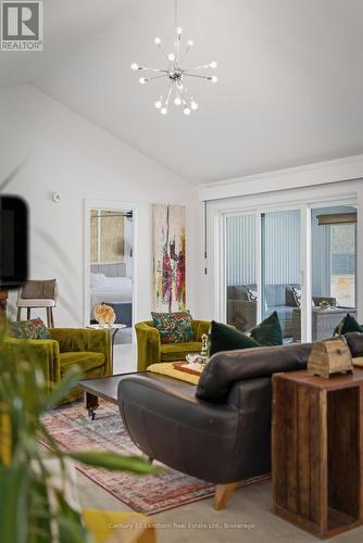 thoughtful details in bringing outdoors, in - 2654 County Road 5, Prince Edward County (Sophiasburg Ward), ON - Indoor Photo Showing Living Room