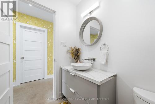 That vintage wallpaper though! - 2654 County Road 5, Prince Edward County (Sophiasburg Ward), ON - Indoor Photo Showing Bathroom