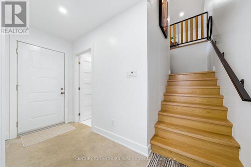 Entry from garage, to laundry & access to upstairs - 2654 County Road 5, Prince Edward County (Sophiasburg Ward), ON - Indoor Photo Showing Other Room