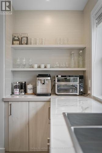 custom finishes - 2654 County Road 5, Prince Edward County (Sophiasburg Ward), ON - Indoor Photo Showing Kitchen