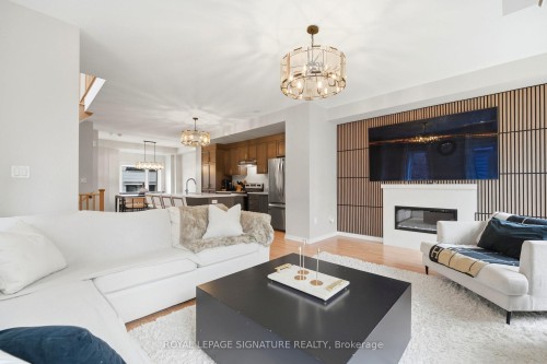 12 Heathrow Lane, Caledon, ON - Indoor Photo Showing Living Room With Fireplace