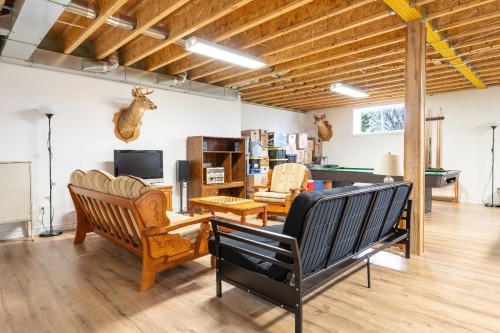 Salle familiale - 721 Rg St-Pierre S., Saint-Constant, QC - Indoor Photo Showing Basement