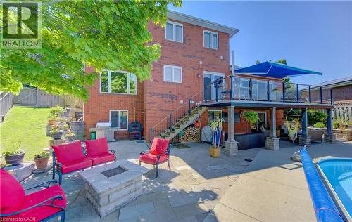 97 Manitoulin Crescent, Kitchener, ON - Outdoor With In Ground Pool With Deck Patio Veranda