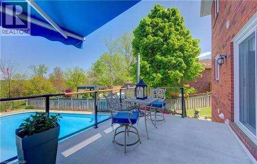 97 Manitoulin Crescent, Kitchener, ON - Outdoor With In Ground Pool With Deck Patio Veranda