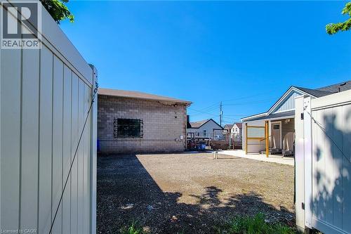 Spacious gravel lot  with a separate gate - 78 Hillyard Street, Hamilton, ON - Outdoor