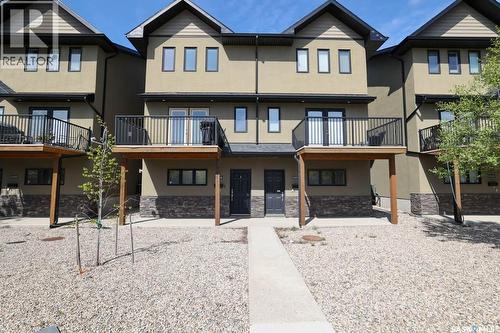 1456 Mccarthy Boulevard, Regina, SK - Outdoor With Balcony With Facade