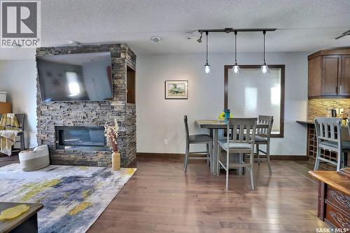 1456 Mccarthy Boulevard, Regina, SK - Indoor Photo Showing Other Room With Fireplace