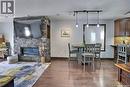 1456 Mccarthy Boulevard, Regina, SK  - Indoor Photo Showing Other Room With Fireplace 