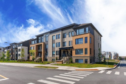 Front of Structure - 2-5805 Rue De Champagnier, Brossard, QC - Outdoor With Facade