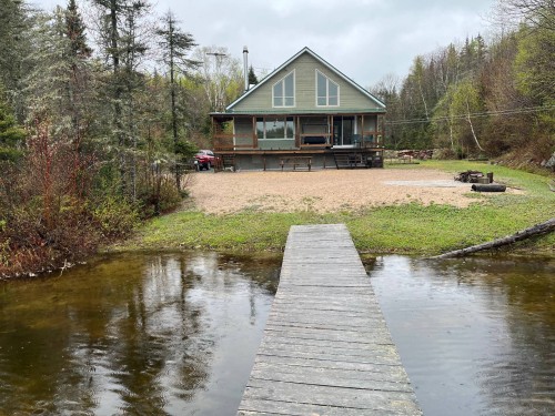 Façade - 962 Route 138, Saint-Siméon, QC - Outdoor With Body Of Water With Deck Patio Veranda