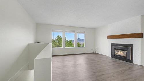 1963 Harrison Way, Kamloops, BC - Indoor Photo Showing Living Room With Fireplace