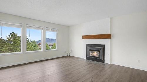 1963 Harrison Way, Kamloops, BC - Indoor Photo Showing Living Room With Fireplace