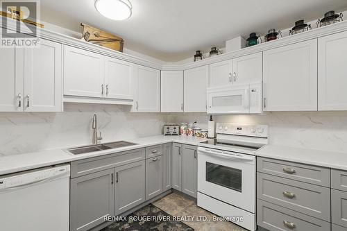 222 - 475 Parkhill Road W, Peterborough, ON - Indoor Photo Showing Kitchen With Double Sink