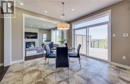264 Evens Pond Crescent, Kitchener, ON - Indoor Photo Showing Dining Room With Fireplace