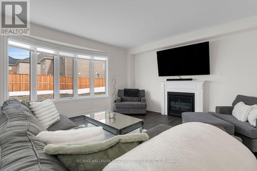 113 Rugman Crescent, Springwater, ON - Indoor Photo Showing Living Room With Fireplace