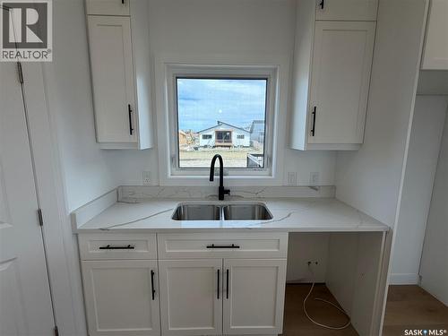 106 Lakewood Drive, Humboldt, SK - Indoor Photo Showing Kitchen With Double Sink