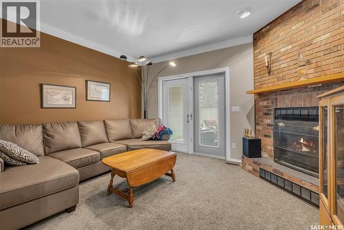 231 Benesh Crescent, Saskatoon, SK - Indoor Photo Showing Living Room With Fireplace