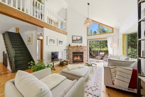Living Room - 250 Ch. Judd, Sutton, QC - Indoor Photo Showing Living Room With Fireplace
