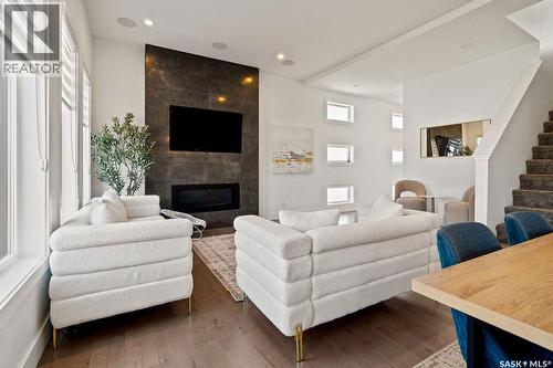 4238 Green Olive Way E, Regina, SK - Indoor Photo Showing Living Room With Fireplace