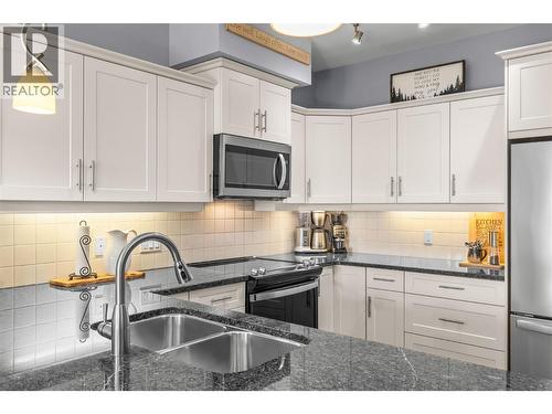 Stainless Steel Whirlpool Appliances - 3735 Casorso Road Unit# 410, Kelowna, BC - Indoor Photo Showing Kitchen With Stainless Steel Kitchen With Double Sink With Upgraded Kitchen