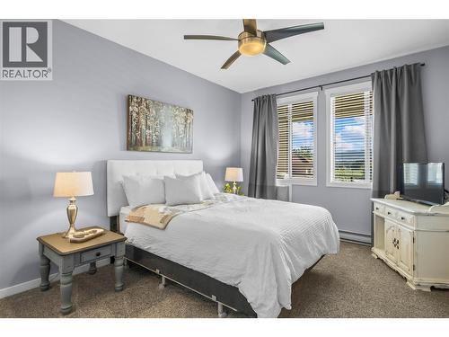 Spacious & Bright Primary Bedroom - 3735 Casorso Road Unit# 410, Kelowna, BC - Indoor Photo Showing Bedroom