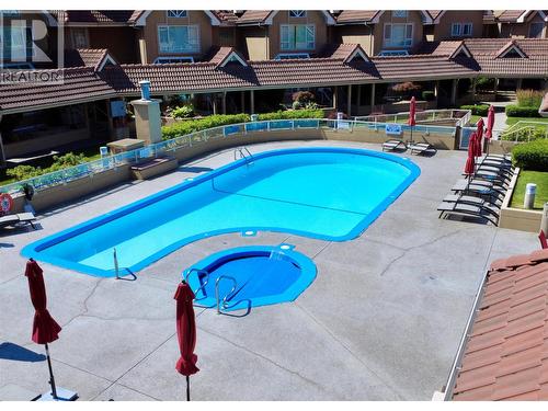 1152 Sunset Drive Unit# 1702, Kelowna, BC - Outdoor With In Ground Pool