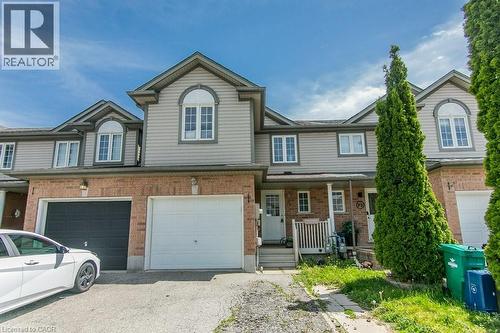 Two-story townhouse with a brick and siding exterior - 71 Foxglove Crescent, Kitchener, ON - Outdoor With Facade