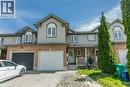 Two-story townhouse with a brick and siding exterior - 71 Foxglove Crescent, Kitchener, ON  - Outdoor With Facade 