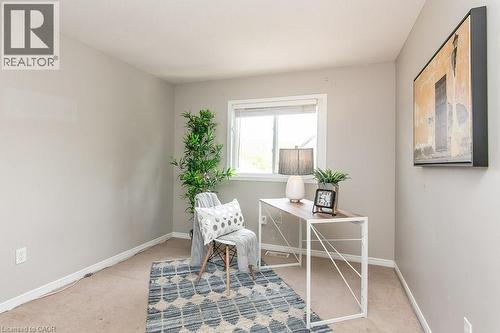 Room with neutral wall paint and light brown carpet flooring - 71 Foxglove Crescent, Kitchener, ON - Indoor Photo Showing Other Room