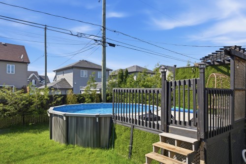Piscine - 267 Rue Capes, Saint-Constant, QC - Outdoor With Above Ground Pool