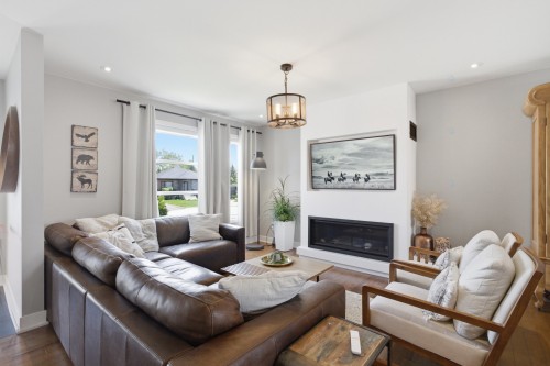 Salon - 267 Rue Capes, Saint-Constant, QC - Indoor Photo Showing Living Room With Fireplace