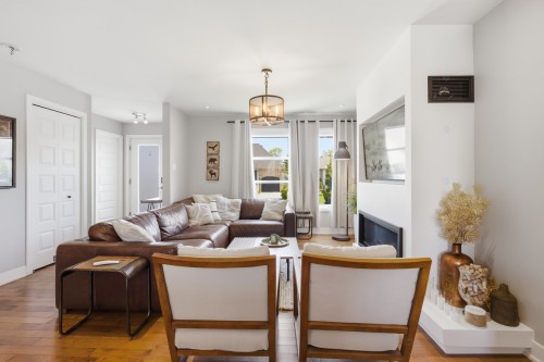 Salon - 267 Rue Capes, Saint-Constant, QC - Indoor Photo Showing Living Room With Fireplace