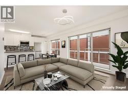 303 1033 ST. GEORGES AVENUE  North Vancouver, BC V7L 3H5