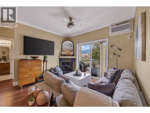 240 Wade Avenue W Avenue Unit# 305, Penticton, BC - Indoor Photo Showing Living Room With Fireplace