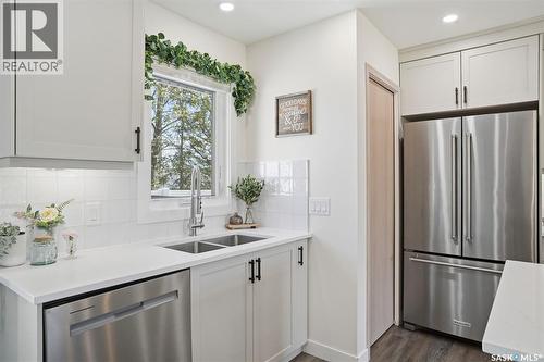 112 8Th Avenue E, Watrous, SK - Indoor Photo Showing Kitchen With Double Sink