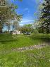 Single-story residence featuring light-toned siding and multiple windows - 28 Derner Line, Lowbanks, ON  - Outdoor With View 