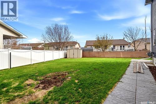 709 Aspen Crescent, Pilot Butte, SK - Outdoor With Backyard