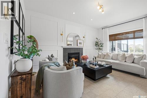 5018 Padwick Road, Regina, SK - Indoor Photo Showing Living Room With Fireplace