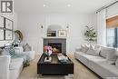 5018 Padwick Road, Regina, SK  - Indoor Photo Showing Living Room With Fireplace 