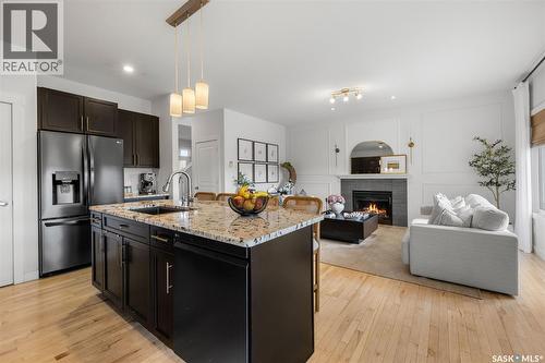 5018 Padwick Road, Regina, SK - Indoor Photo Showing Kitchen With Fireplace With Stainless Steel Kitchen With Upgraded Kitchen