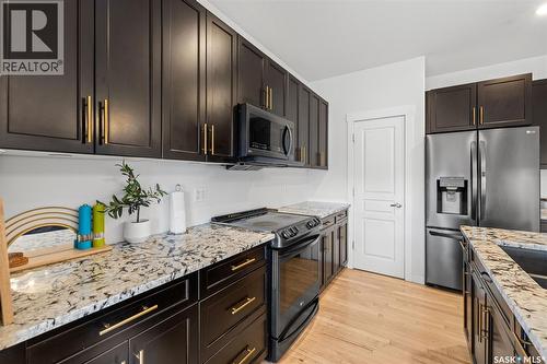 5018 Padwick Road, Regina, SK - Indoor Photo Showing Kitchen With Stainless Steel Kitchen With Double Sink With Upgraded Kitchen