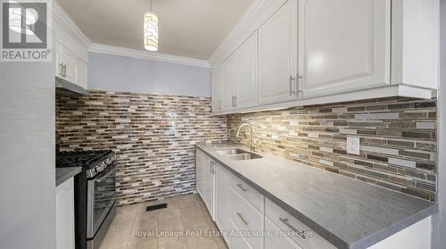 95 Quantrell Trail, Toronto, ON - Indoor Photo Showing Kitchen With Double Sink