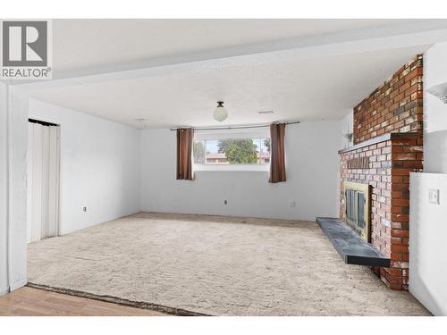 2877 Springfield Road, Kelowna, BC - Indoor With Fireplace