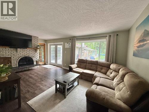 1262 Croft Road, Quesnel, BC - Indoor Photo Showing Living Room With Fireplace