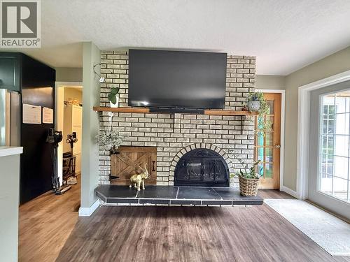 1262 Croft Road, Quesnel, BC - Indoor Photo Showing Living Room With Fireplace