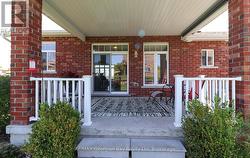 COVERED DECK OFF KITCHEN - 