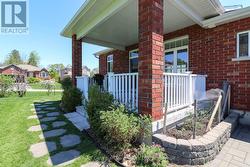 COVERED DECK OFF KITCHEN - 